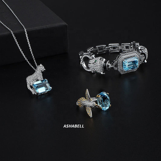 Topaz Snow Leopard Pendant Necklace Bracelet Ring Set